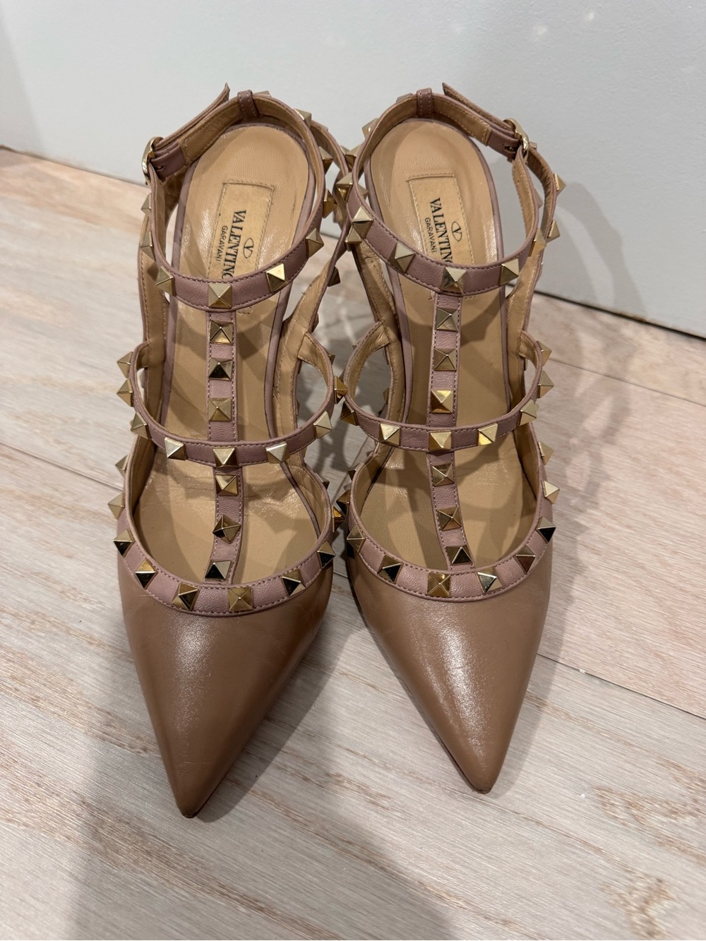 Valentino Garavani Rockstud Pointed T-Strap Pumps in Tan with Gold Studs